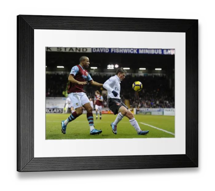 Framed Print : Andrey Arshavin (Arsenal) Tyrone Mears (Burnley). Burnley 1: 1 Arsenal, Barclays Premier League Framed Print : Andrey Arshavin (Arsenal) Tyrone Mears (Burnley). Burnley 1: 1 Arsenal, Barclays Premier League