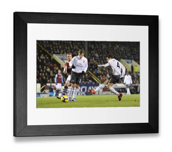Framed Print : Cesc Fabregas shoots past Burnley goalkeeper Brian Jensen to score the Arsenal goal Framed Print : Cesc Fabregas shoots past Burnley goalkeeper Brian Jensen to score the Arsenal goal
