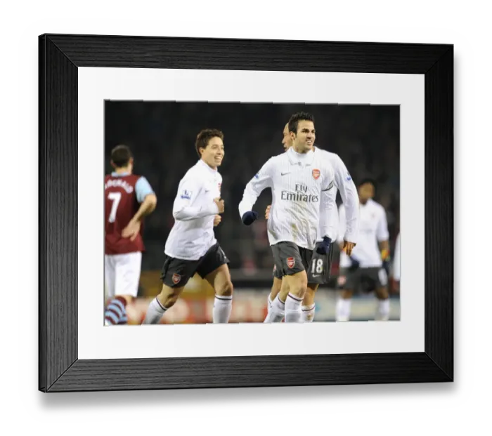 Framed Print : Cesc Fabregas celebrates scoring the Arsenal goal with Samir Nasri and Mikael Silvestre Framed Print : Cesc Fabregas celebrates scoring the Arsenal goal with Samir Nasri and Mikael Silvestre