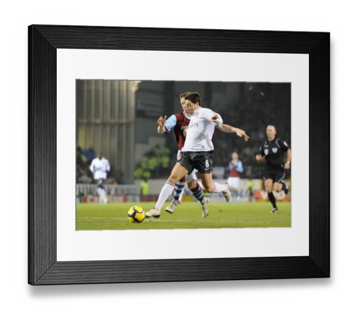 Framed Print : Samir Nasri (Arsenal) Steven Caldwell (Burnley). Burnley 1: 1 Arsenal, Barclays Premier League
