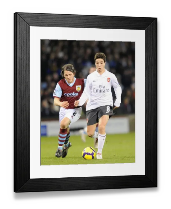 Framed Print : Samir Nasri (Arsenal) Joey Gudjonsson (Burnley). Burnley 1: 1 Arsenal, Barclays Premier League