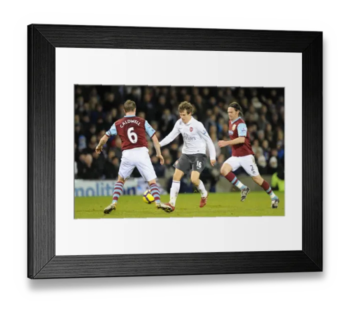 Framed Print : Aaron Ramsey (Arsenal) Steven Caldwell (Burnley). Burnley 1: 1 Arsenal, Barclays Premier League Framed Print : Aaron Ramsey (Arsenal) Steven Caldwell (Burnley). Burnley 1: 1 Arsenal, Barclays Premier League