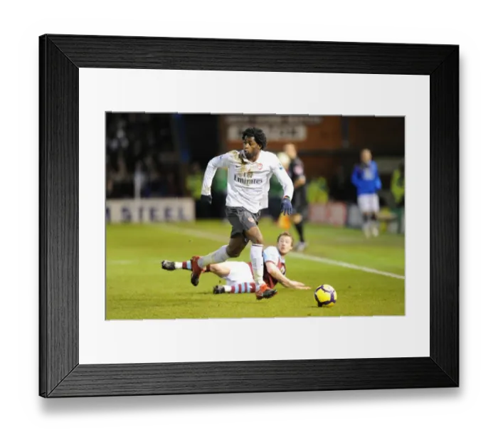 Framed Print : Arsenal's Alex Song vs. Wade Elliott's Burnley: A 1-1 Stalemate in the Barclays Premier League Framed Print : Arsenal's Alex Song vs. Wade Elliott's Burnley: A 1-1 Stalemate in the Barclays Premier League