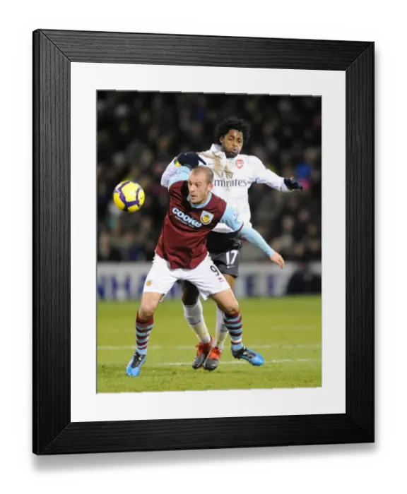 Framed Print : Alex Song (Arsenal) Steven Fletcher (Burnley). Burnley 1: 1 Arsenal, Barclays Premier League