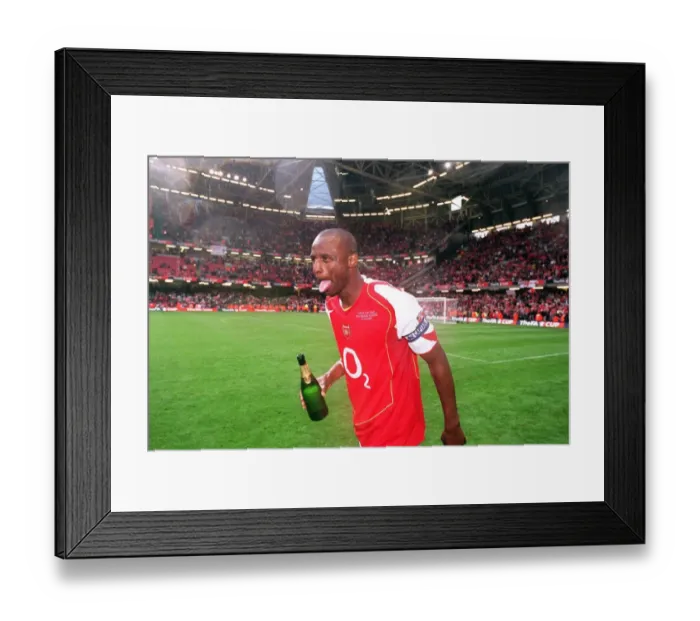 Framed Print : Patrick Vieira (Arsenal) celebrates with some Champagne after the match