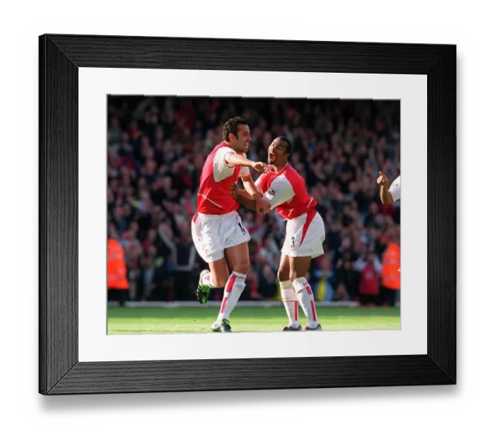 Framed Print : Edu celebrates scoring Arsenals 1st goal from a free kick with Ashley Cole Framed Print : Edu celebrates scoring Arsenals 1st goal from a free kick with Ashley Cole