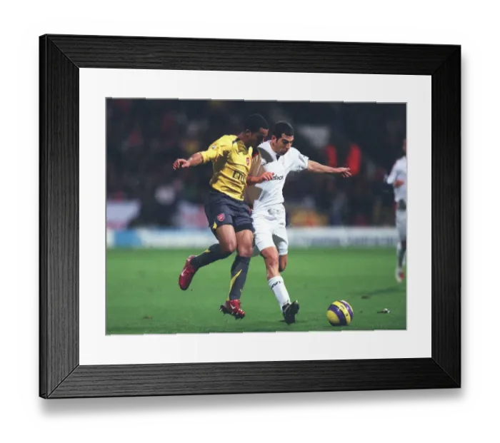 Framed Print : Theo Walcott (Arsenal) Tal Ben Haim (Bolton)