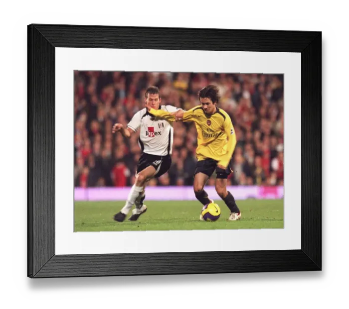 Framed Print : Tomas Rosicky (Arsenal) Brian McBride (Fulham) Framed Print : Tomas Rosicky (Arsenal) Brian McBride (Fulham)