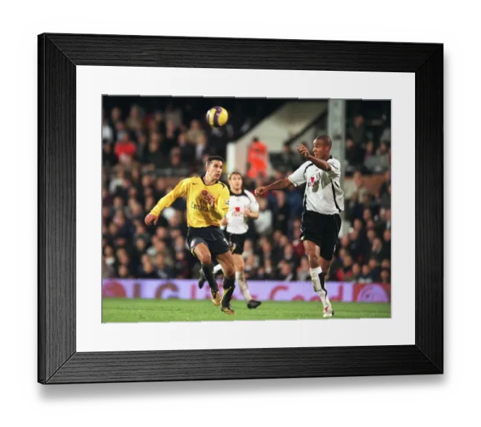 Framed Print : Van Persie vs. Knight: A Tight Battle at Craven Cottage - Arsenal's 2:1 Loss to Fulham Framed Print : Van Persie vs. Knight: A Tight Battle at Craven Cottage - Arsenal's 2:1 Loss to Fulham