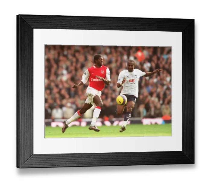 Framed Print : Emmanuel Adebayor (Arsenal) Didier Zakora (Tottenham) Framed Print : Emmanuel Adebayor (Arsenal) Didier Zakora (Tottenham)