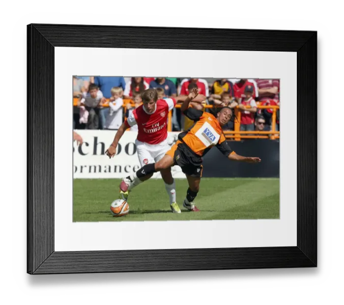 Framed Print : Andrey Arshavin (Arsenal) Sam Cox (Barnet). Barnet 0: 4 Arsenal. Pre Season Friendly Framed Print : Andrey Arshavin (Arsenal) Sam Cox (Barnet). Barnet 0: 4 Arsenal. Pre Season Friendly