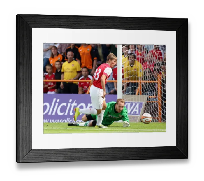 Framed Print : Andrey Arshavin rounds Jake Cole (Barnet) to scores Arsenals 1st goal Framed Print : Andrey Arshavin rounds Jake Cole (Barnet) to scores Arsenals 1st goal