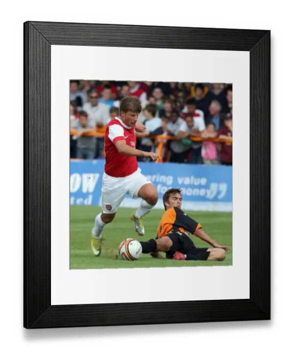Framed Print : Andrey Arshavin (Arsenal) Ricky Holmes (Barnet). Barnet 0: 4 Arsenal. Pre Season Friendly Framed Print : Andrey Arshavin (Arsenal) Ricky Holmes (Barnet). Barnet 0: 4 Arsenal. Pre Season Friendly