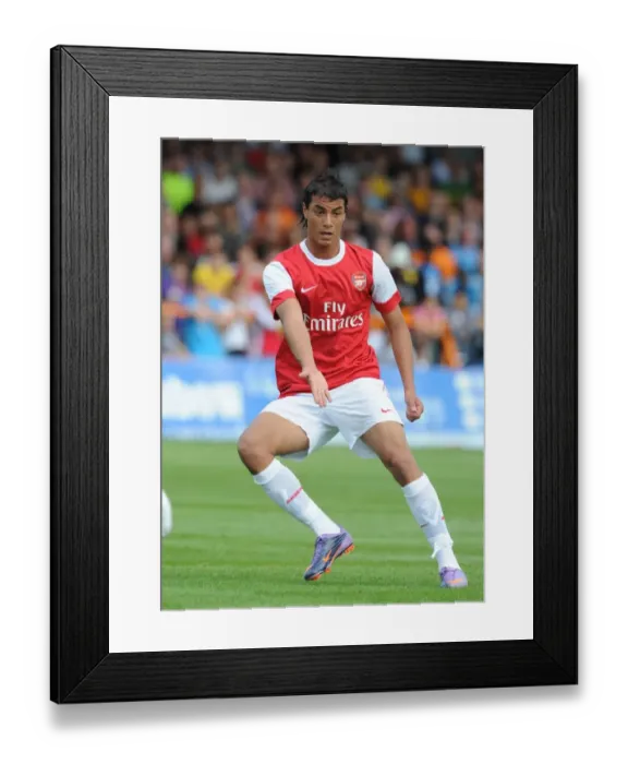 Framed Print : Marouane Chamakh's Stellar Performance: Arsenal Dominates Barnet 4-0 in Pre-Season Friendly Framed Print : Marouane Chamakh's Stellar Performance: Arsenal Dominates Barnet 4-0 in Pre-Season Friendly