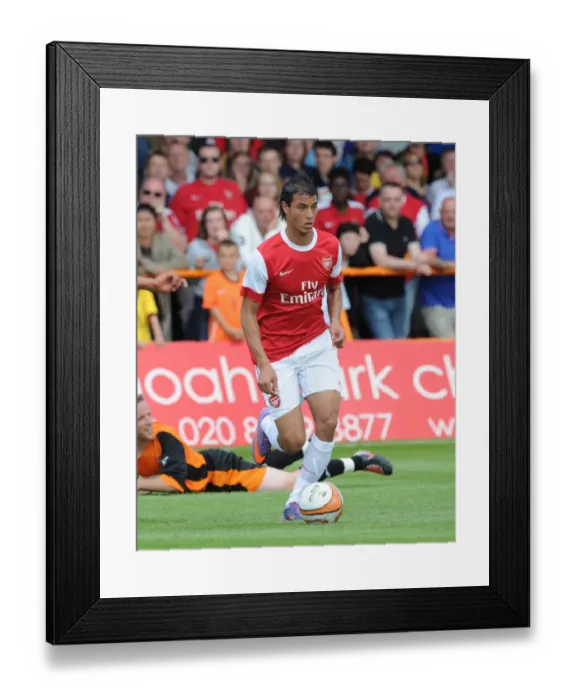 Framed Print : Arsenal's Marouane Chamakh Shines in 4-0 Pre-Season Victory Over Barnet