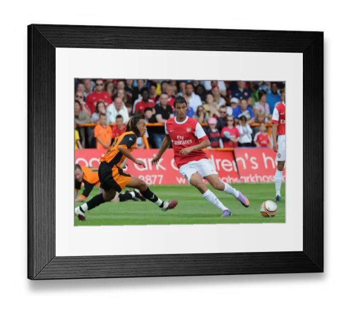 Framed Print : Marouane Chamakh (Arsenal) Sam Cox (Barnet). Barnet 0: 4 Arsenal, Pre season friendly