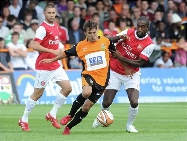 Johan Djourou (Arsenal) Ricky Holmes (Barnet). Barnet 0: 4 Arsenal, Pre season friendly