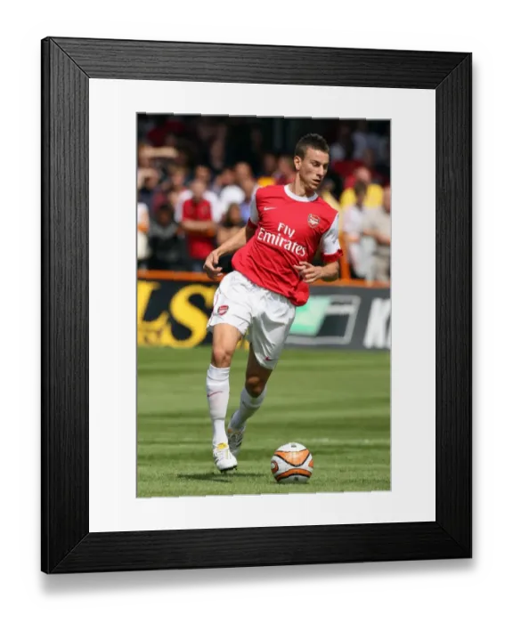 Framed Print : Arsenal's Koscielny Shines in Barnet's Defeat: 4-0 Pre-Season Victory Framed Print : Arsenal's Koscielny Shines in Barnet's Defeat: 4-0 Pre-Season Victory