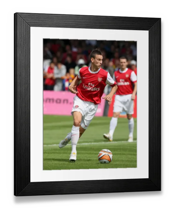 Framed Print : Arsenal's Koscielny Stars in Pre-Season Triumph: 4-0 Over Barnet (July 17, 2010) Framed Print : Arsenal's Koscielny Stars in Pre-Season Triumph: 4-0 Over Barnet (July 17, 2010)