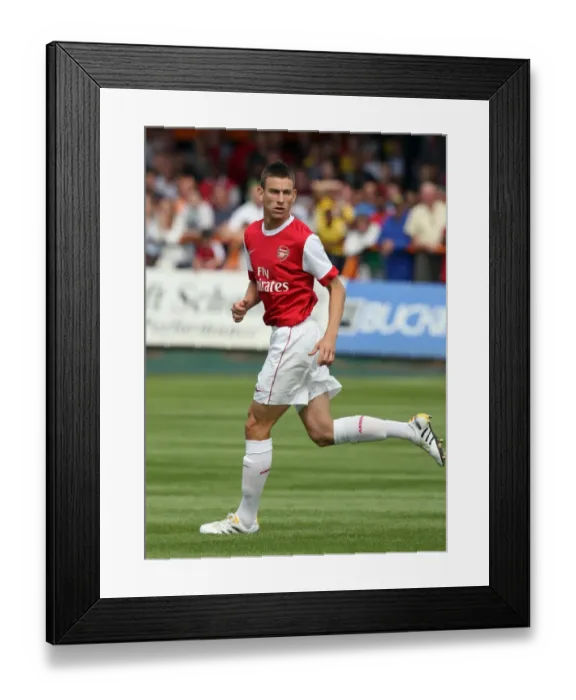 Framed Print : Arsenal's Koscielny Shines in 4-0 Pre-Season Victory Over Barnet (July 17, 2010)
