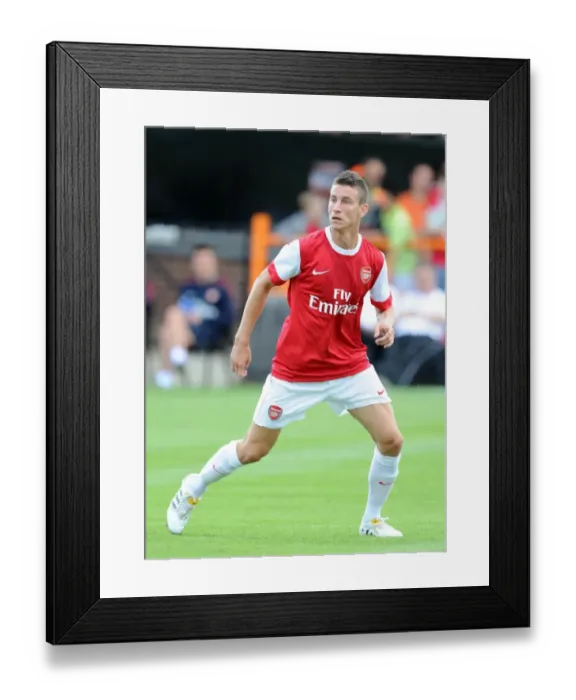 Framed Print : Arsenal's Koscielny Shines in 4-0 Pre-Season Victory over Barnet Framed Print : Arsenal's Koscielny Shines in 4-0 Pre-Season Victory over Barnet