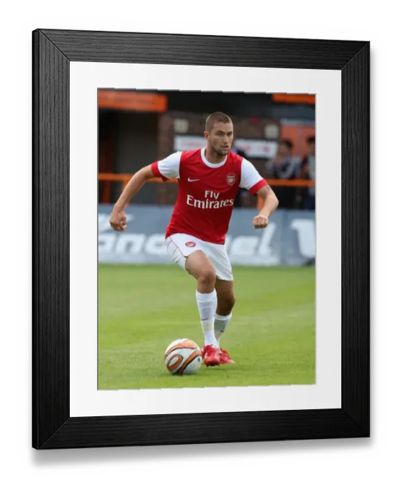 Framed Print : Henri Lansbury Shines in Arsenal's 4-0 Pre-Season Victory over Barnet Framed Print : Henri Lansbury Shines in Arsenal's 4-0 Pre-Season Victory over Barnet