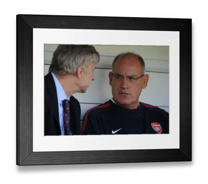 Framed Print : Arsenal 1st team coach Boro Primorac talks with manager Arsene Wenger. Barnet 0: 4 Arsenal