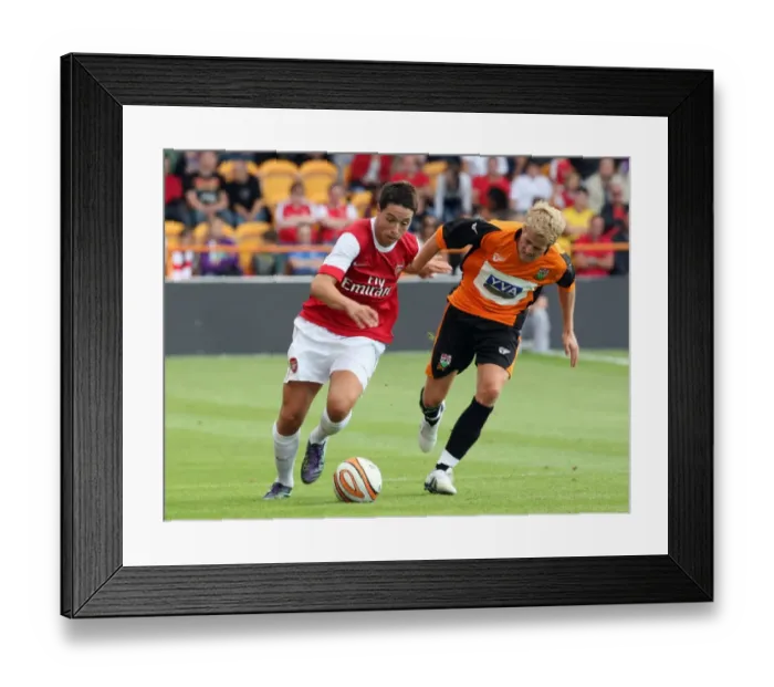 Framed Print : Samir Nasri (Arsenal) Jordan Parkes (Barnet). Barnet 0: 4 Arsenal. Pre Season Friendly Framed Print : Samir Nasri (Arsenal) Jordan Parkes (Barnet). Barnet 0: 4 Arsenal. Pre Season Friendly