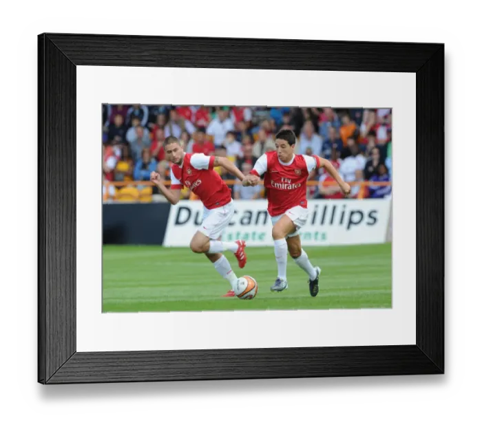 Framed Print : Samir Nasri and Henri Lansbury (Arsenal). Barnet 0: 4 Arsenal, Pre season friendly Framed Print : Samir Nasri and Henri Lansbury (Arsenal). Barnet 0: 4 Arsenal, Pre season friendly