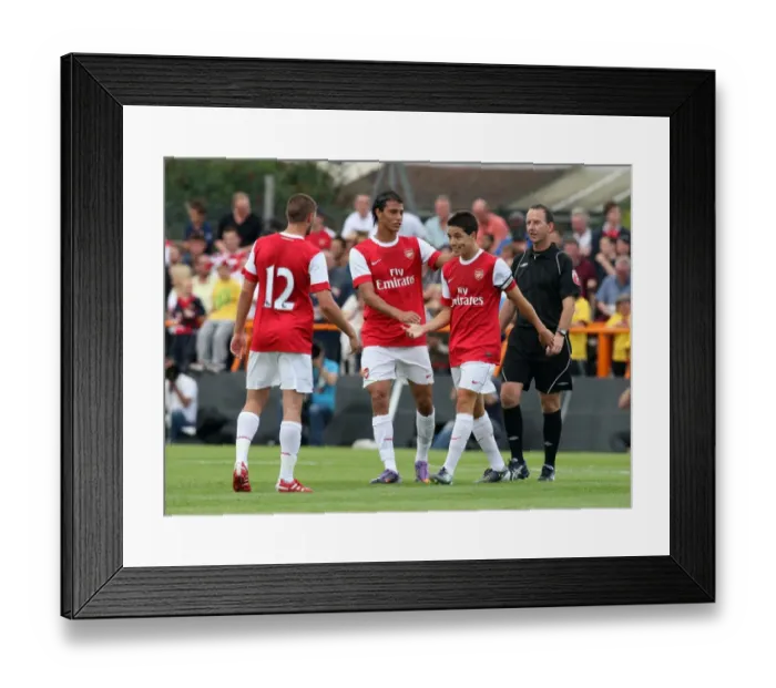 Framed Print : Samir Nasri celebrates scoring Arsenals 4th goal with Marouane Chamakh