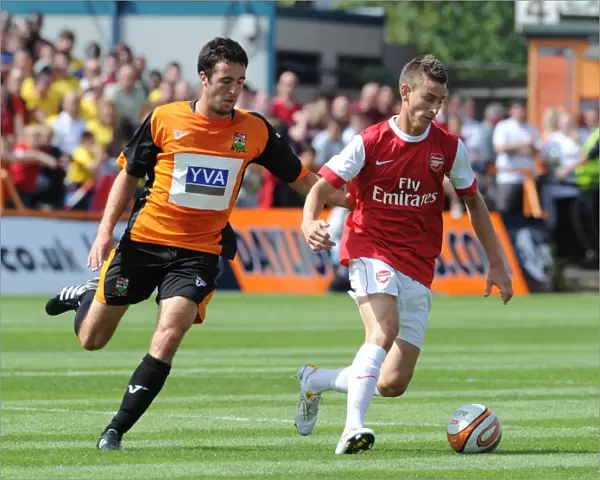 Laurent Koscielny (Arsenal) Danny Kelly (Barnet). Barnet 0: 4 Arsenal, Pre season friendly