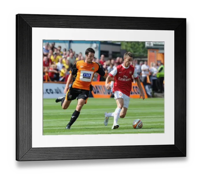 Framed Print : Laurent Koscielny (Arsenal) Danny Kelly (Barnet). Barnet 0: 4 Arsenal, Pre season friendly