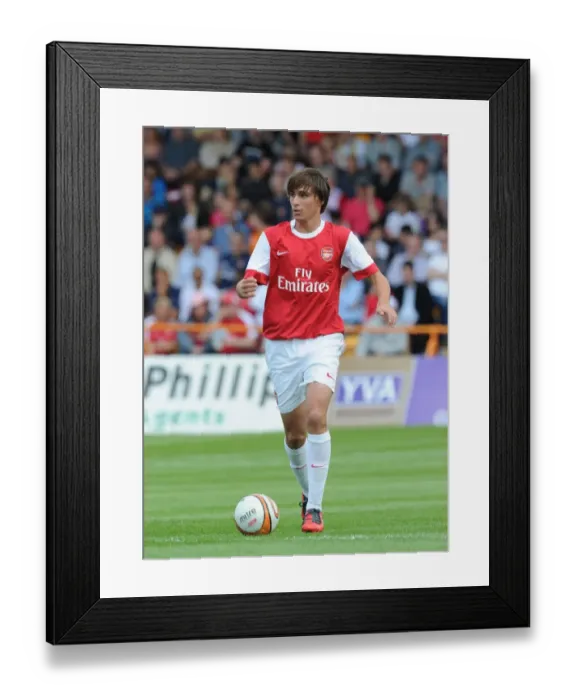 Framed Print : Ignasi Miquel's Brilliant Performance: Arsenal Crushes Barnet 4-0 in Pre-Season Friendly (17.07.2010)