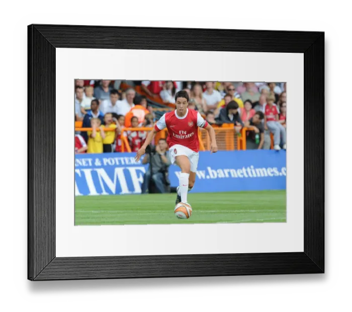 Framed Print : Samir Nasri in Action: Arsenal Crush Barnet 4-0 in Pre-Season Friendly