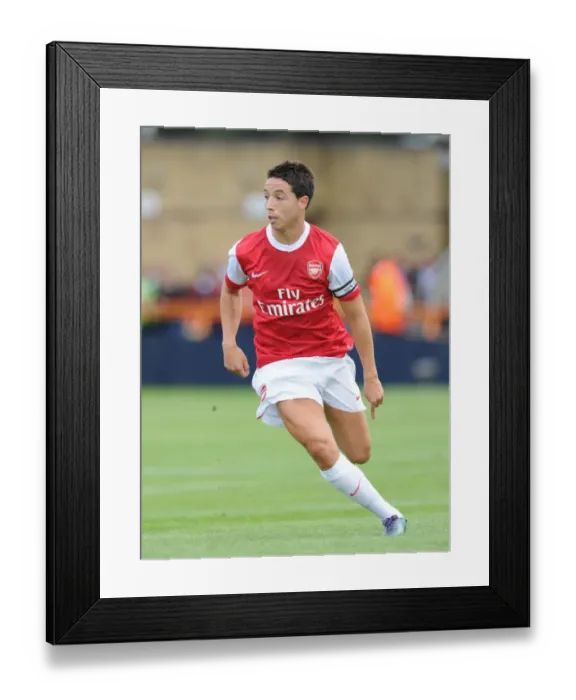 Framed Print : Samir Nasri's Brilliant Performance Leads Arsenal to 4-0 Pre-Season Victory over Barnet Framed Print : Samir Nasri's Brilliant Performance Leads Arsenal to 4-0 Pre-Season Victory over Barnet