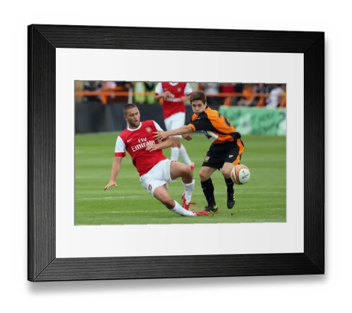 Framed Print : Henri Lansbury (Arsenal) John McGicks (Barnet). Barnet 0: 4 Arsenal. Pre Season Friendly Framed Print : Henri Lansbury (Arsenal) John McGicks (Barnet). Barnet 0: 4 Arsenal. Pre Season Friendly