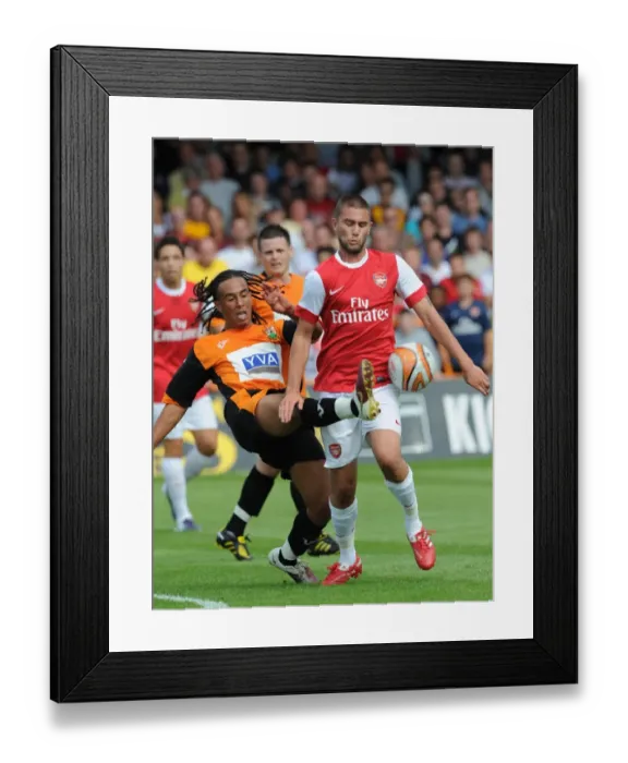 Framed Print : Henri Lansbury (Arsenal) Sam Cox (Barnet). Barnet 0: 4 Arsenal, Pre season friendly