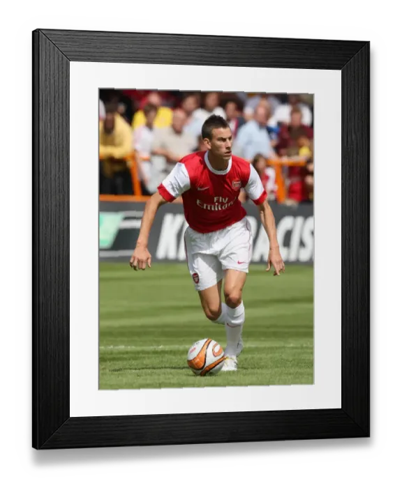 Framed Print : Arsenal's Koscielny Shines in 4-0 Pre-Season Victory over Barnet Framed Print : Arsenal's Koscielny Shines in 4-0 Pre-Season Victory over Barnet