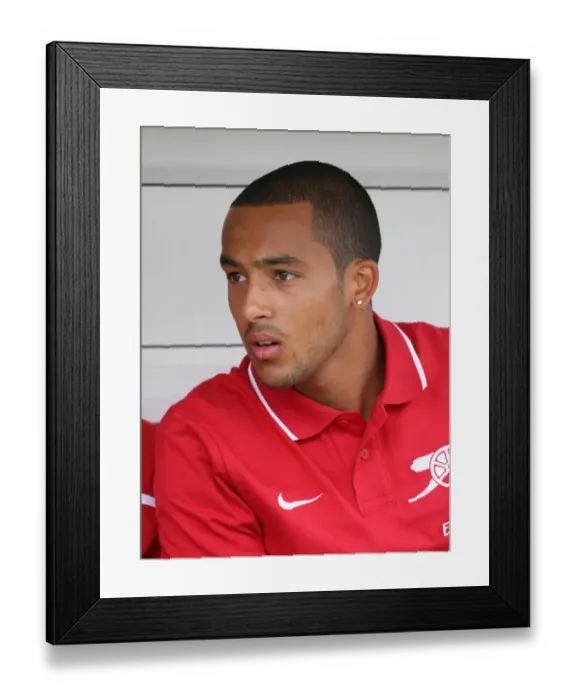 Framed Print : Theo Walcott's Brilliant Performance: Arsenal Crush Barnet 4-0 in Pre-Season Friendly