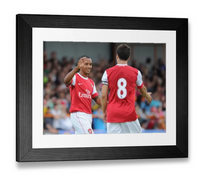 Framed Print : Theo Walcott celebrates with Samir Nasri (Arsenal). Barnet 0: 4 Arsenal Framed Print : Theo Walcott celebrates with Samir Nasri (Arsenal). Barnet 0: 4 Arsenal