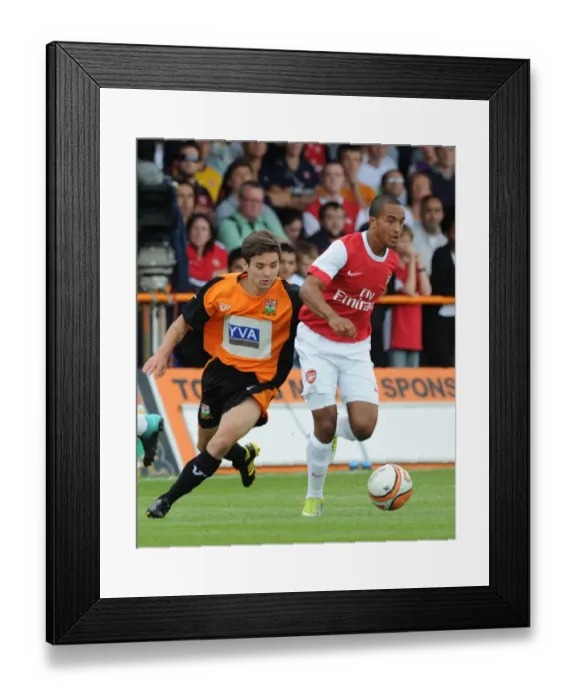 Framed Print : Theo Walcott's Dominance: Arsenal Crush Barnet 4-0 in Pre-Season Friendly Framed Print : Theo Walcott's Dominance: Arsenal Crush Barnet 4-0 in Pre-Season Friendly