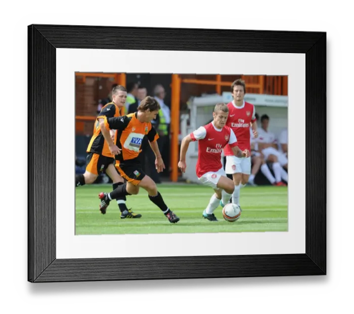Framed Print : Jack Wilshere (Arsenal) Mark Hughes (Barnet). Barnet 0: 4 Arsenal, Pre season friendly