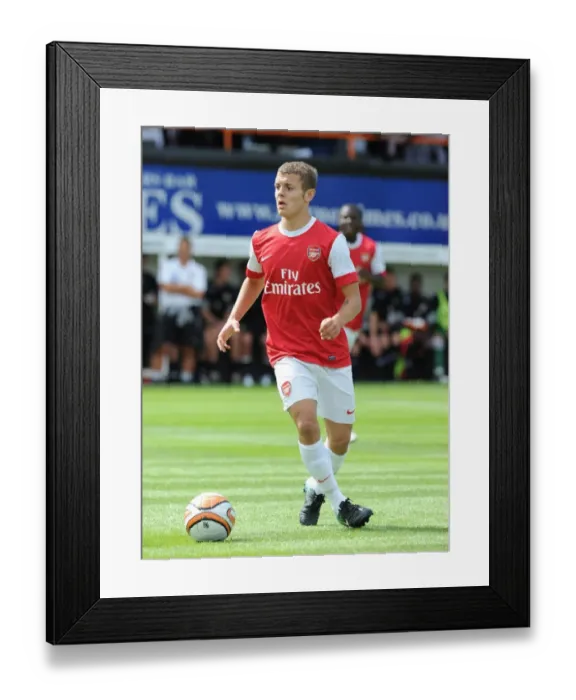 Framed Print : Jack Wilshere's Standout Performance: Arsenal Crushes Barnet 4-0 in Pre-Season Friendly Framed Print : Jack Wilshere's Standout Performance: Arsenal Crushes Barnet 4-0 in Pre-Season Friendly