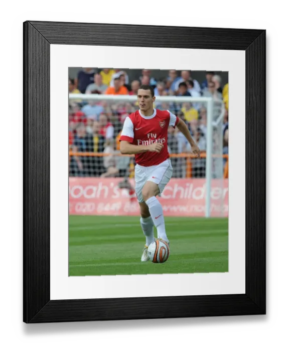 Framed Print : Thomas Vermaelen's Dominant Performance: Arsenal Crushes Barnet 4-0 in Pre-Season Friendly Framed Print : Thomas Vermaelen's Dominant Performance: Arsenal Crushes Barnet 4-0 in Pre-Season Friendly