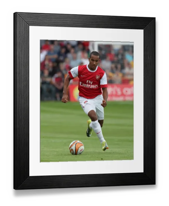 Framed Print : Theo Walcott's Shining Performance: Arsenal's 4-0 Pre-Season Victory Over Barnet Framed Print : Theo Walcott's Shining Performance: Arsenal's 4-0 Pre-Season Victory Over Barnet
