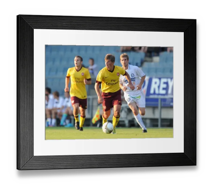 Framed Print : Andrey Arshavin (Arsenal) Ferdinand Feldhofer (Sturm Graz). Sturm Graz 0: 4 Arsenal Framed Print : Andrey Arshavin (Arsenal) Ferdinand Feldhofer (Sturm Graz). Sturm Graz 0: 4 Arsenal