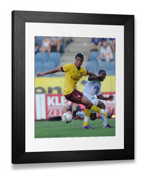Framed Print : Marouane Chamakh's Dominant Display: Arsenal Thrashes Sturm Graz 4-0