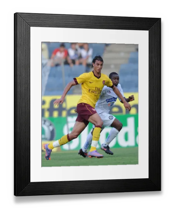 Framed Print : Marouane Chamakh (Arsenal) Pa Siko Kujabi (Sturm Graz). Sturm Graz 0: 4 Arsenal Framed Print : Marouane Chamakh (Arsenal) Pa Siko Kujabi (Sturm Graz). Sturm Graz 0: 4 Arsenal