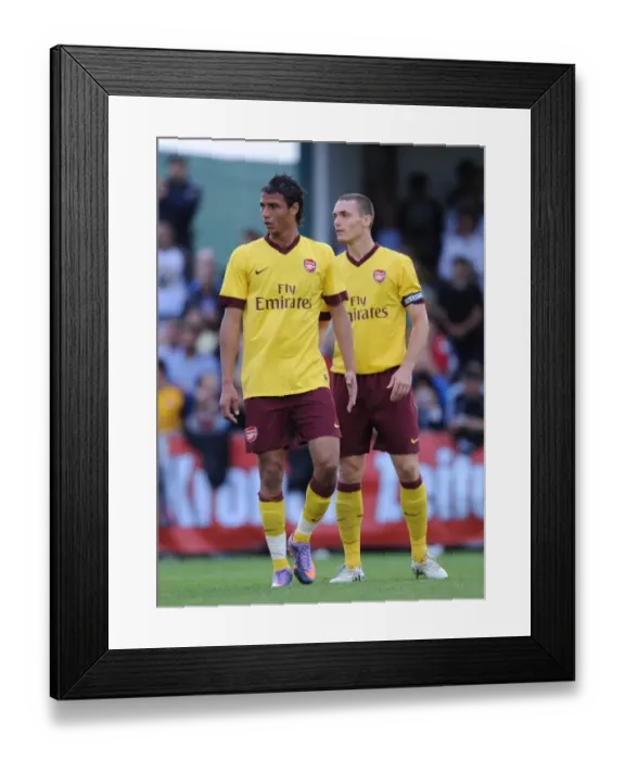 Framed Print : Marouane Chamakh and Thomas Vermaelen (Arsenal). SC Neusiedl 0: 4 Arsenal