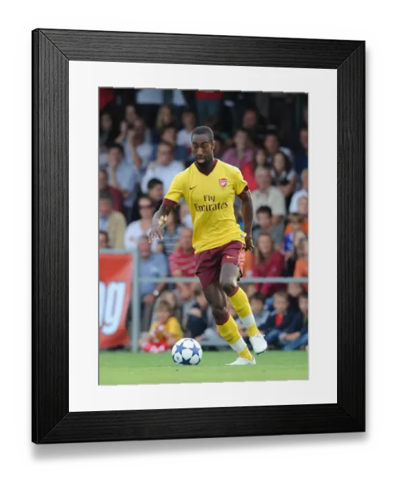 Framed Print : Arsenal's Johan Djourou Shines in 4-0 Win Over SC Neusiedl
